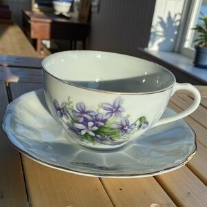 Porcelain teacup and saucer, vintage, violet pattern, gold trim